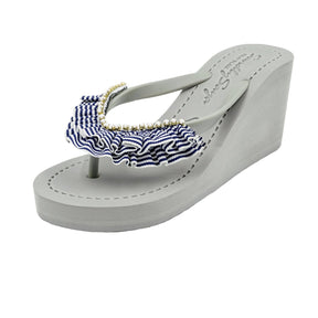 White and blue strip with white stones